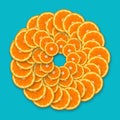 Beautiful spiral pattern of orange slices on a turquoise background. Top view, flat lay