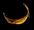 Beautiful splashes of olive oil or machine oil on a black background