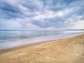 A beautiful splashing swash silky smooth water reflection on beach.