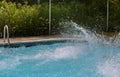 Beautiful splashing water in swimming pool Royalty Free Stock Photo