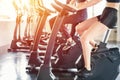 Beautiful sport woman working out on exercise bike at sport health club Royalty Free Stock Photo