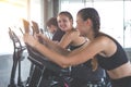 Beautiful sport woman working out on exercise bike at sport health club Royalty Free Stock Photo