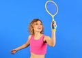 Beautiful sportswoman with racket. Happy girl playing tennis. Sport, fitness and game concept. Royalty Free Stock Photo