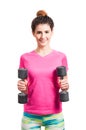 Beautiful sporty woman exercising with two dumbbells Royalty Free Stock Photo