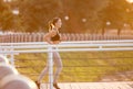 Beautiful sporty young woman running over bridge Royalty Free Stock Photo