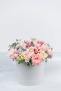 Beautiful spring bouquet in round box. Arrangement with various flowers. The concept of a flower shop. A set of photos Royalty Free Stock Photo