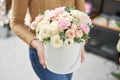 Beautiful spring bouquet in round box. Arrangement with various flowers. The concept of a flower shop. A set of photos Royalty Free Stock Photo