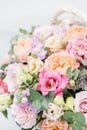 Beautiful spring bouquet in wicker basket. Arrangement with various flowers. The concept of a flower shop. A set of Royalty Free Stock Photo