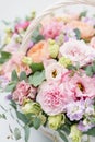 Beautiful spring bouquet in wicker basket. Arrangement with various flowers. The concept of a flower shop. A set of Royalty Free Stock Photo