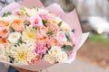 Beautiful spring bouquet in woman hand. Arrangement with various flowers. The concept of a flower shop. A set of photos