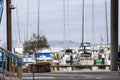 a beautiful spring landscape at Fisherman\'s Wharf on Pier 39 with boats and yachts docked in the harbor with ocean water Royalty Free Stock Photo