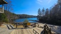 A beautiful spring landscape at Unicoi Lake with rippling blue water and lush green trees, grass and plants at Unicoi Beach Royalty Free Stock Photo