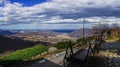 Beautiful spring panaroma over a valley with a wagon infront