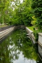 Beautiful spring river and forest. Nature Reflection of trees in the water. Abstract natural background. Blurry Royalty Free Stock Photo