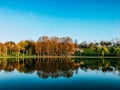 Beautiful Spring Trees Reflections In Water Lake Of Tineretului Park In Bucharest Royalty Free Stock Photo