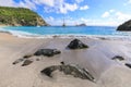 Beautiful St Bart`s Shell Beach with no people and yachts off shore Royalty Free Stock Photo