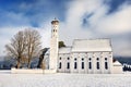 Beautiful St. Coloman pilgrimage church, Bavaria, Germany in snowy winter day Royalty Free Stock Photo