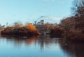 Beautiful St. James`s park view in autumn with the London Eye in the background. Central London Royalty Free Stock Photo