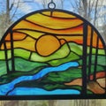 Stained Glass Window: Sunset Over Mountains and River Royalty Free Stock Photo