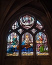 Beautiful stained glass window inside Notre Dame de Paris. Royalty Free Stock Photo