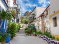 Beautiful stairway with flowers in the old city of Alicante Royalty Free Stock Photo