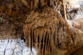 Stalagmite formations in limestone cave. Royalty Free Stock Photo