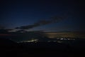 Beautiful starry sky over the village in the Ukrainian Carpathians. Night landscape Royalty Free Stock Photo