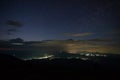 Beautiful starry sky over the village in the Ukrainian Carpathians. Night landscape Royalty Free Stock Photo