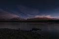 Beautiful night time mountain lake Starscape