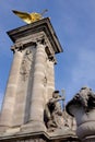 Beautiful statue atop the iconic Pont Alexandre III bridge, an architectural marvel over Seine Royalty Free Stock Photo