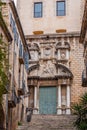 Beautiful steps and archway of the Pujada de Sant Domenec located in the Jewish Quarter of Girona, Spain Royalty Free Stock Photo