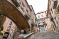 Beautiful steps and archway of the Pujada de Sant Domenec located in the Jewish Quarter of Girona, Spain