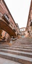 Beautiful steps and archway of the Pujada de Sant Domenec located in the Jewish Quarter of Girona, Spain