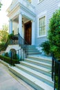 Beautiful steps leading to portico with ionic pillars Royalty Free Stock Photo