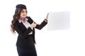 beautiful stewardess pointing on empty board Royalty Free Stock Photo