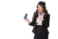 beautiful stewardess pointing on smartphone with facebook website