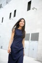 Beautiful stewardess walking to convention center Royalty Free Stock Photo