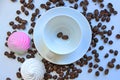 Still life with a clean coffee Cup and saucer and coffee beans scattered on the table Royalty Free Stock Photo