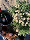 Beautiful still life flowers glass of wine champagne and fruits in background sea Royalty Free Stock Photo