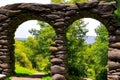 A beautiful stone arch architecture, nature landscape, brick archway, generative ai