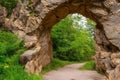 A beautiful stone arch architecture, nature landscape, brick archway, generative ai