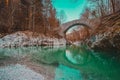 Beautiful stone bridge on Nadige river in enchanted forest Royalty Free Stock Photo