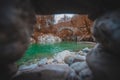 Beautiful stone bridge on Nadige river in enchanted forest Royalty Free Stock Photo