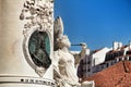 Beautiful stone carved sculptures at the base of King Joseph I statue