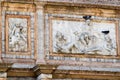 Beautiful stone carvings & decorations adorning a wall of St. Mark`s Basilica in Venice Royalty Free Stock Photo