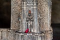 Beautiful stone carvings on a pillar of an ancient Hindu temple