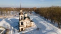 Beautiful stone church on a background of white snow. Sunny winter day. Royalty Free Stock Photo