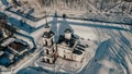 Beautiful stone church on a background of white snow. Sunny winter day. Royalty Free Stock Photo