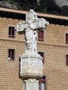 Beautiful stone cross with biblical figures on it Royalty Free Stock Photo