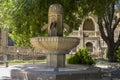 Beautiful stone fountain in the Governor`s garden of Baku, Azerbaijan. Fountain close-up in the shade of trees on a hot summer day Royalty Free Stock Photo